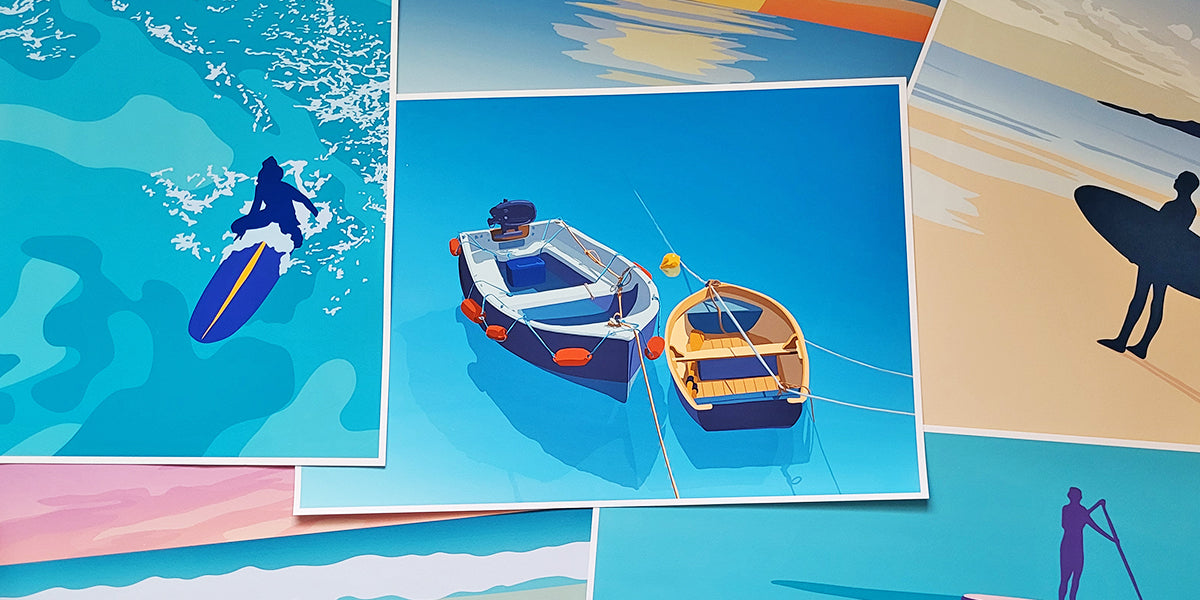 A collection of colourful, coastal limited edition signed prints, including surfers, boats, sunsets, and paddleboarder.