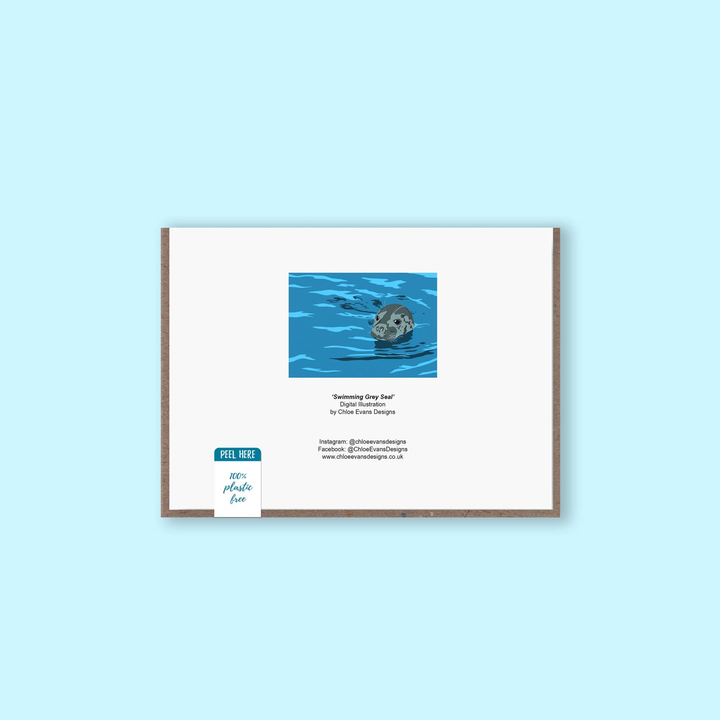 Back of a grey seal swimming greeting card with recycled kraft envelope and plastic free packaging sticker