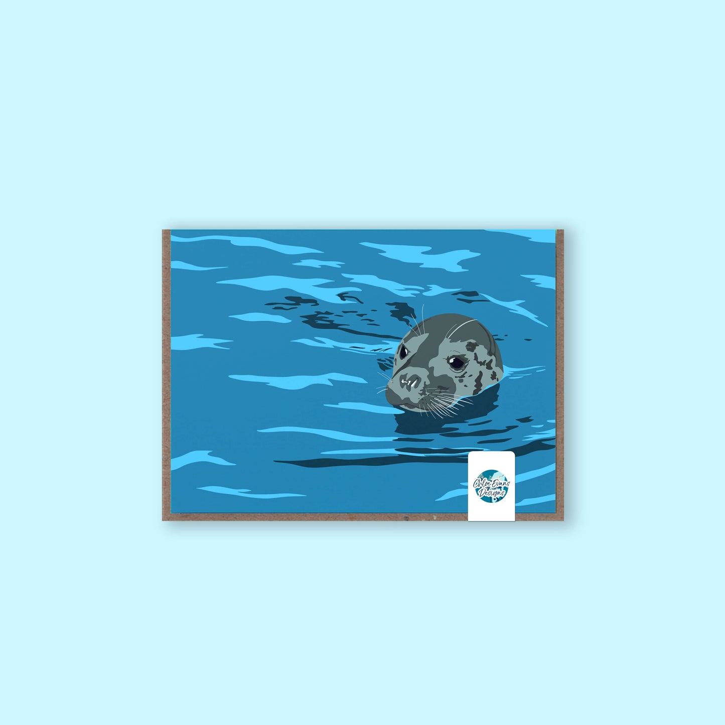 Grey seal swimming greeting card with recycled kraft envelope and plastic free packaging sticker