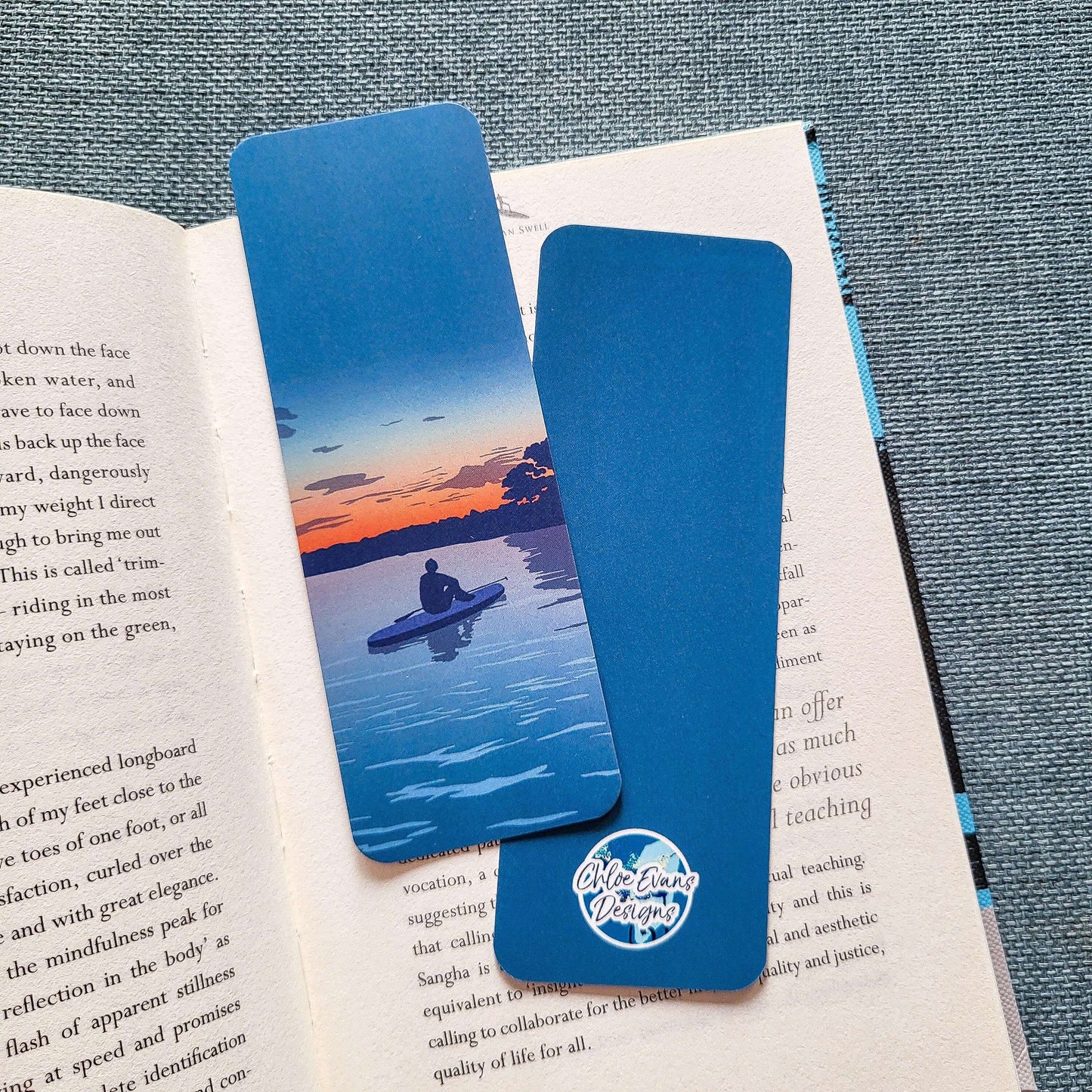 A sunset paddleboarder bookmark for lovers of the sea and slow evenings. Tear-proof and double-sided – designed in the UK by Chloe Evans.