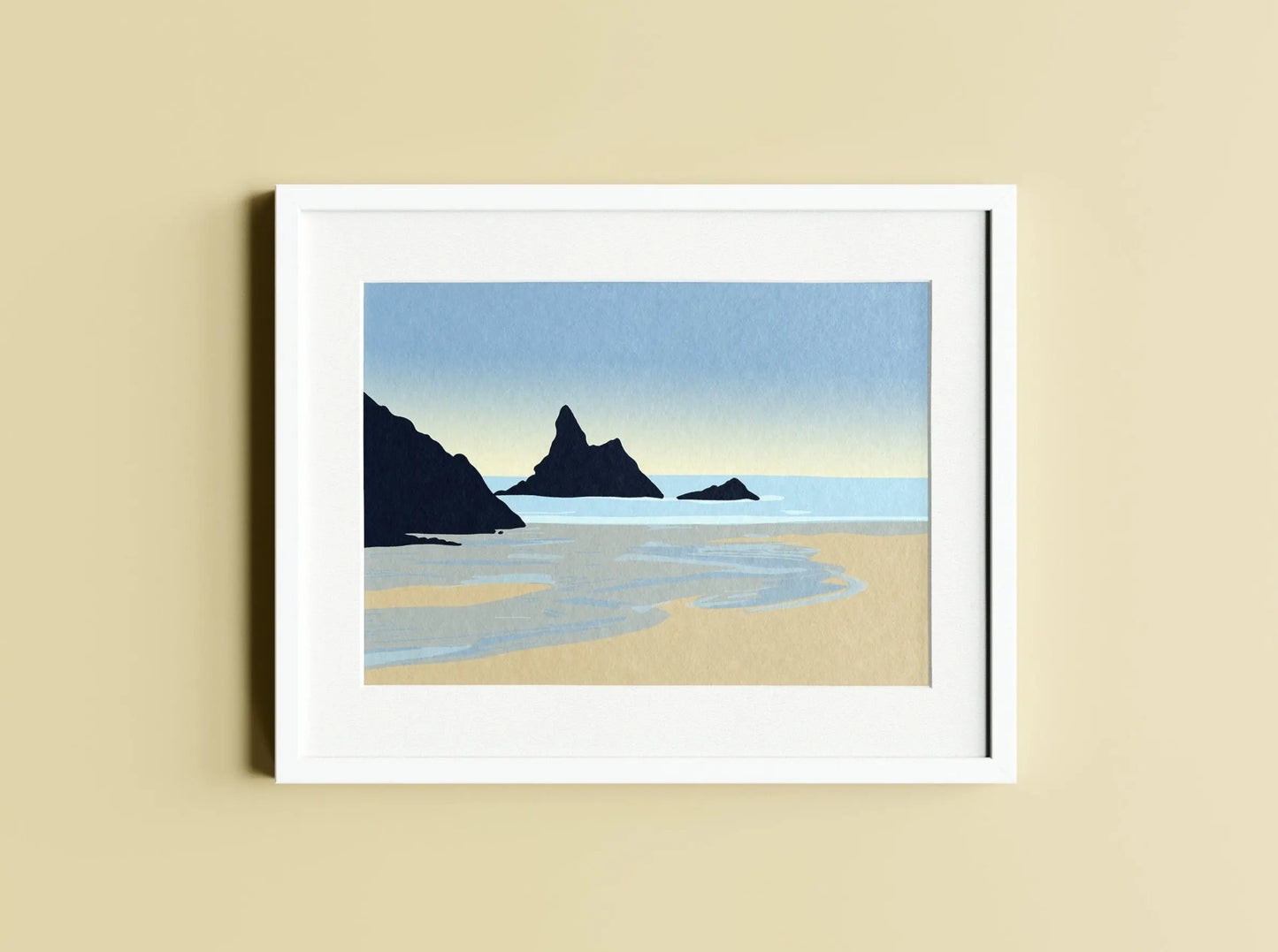 Digital mockup of a framed print. Broad Haven South beach illustration in blue and brown.