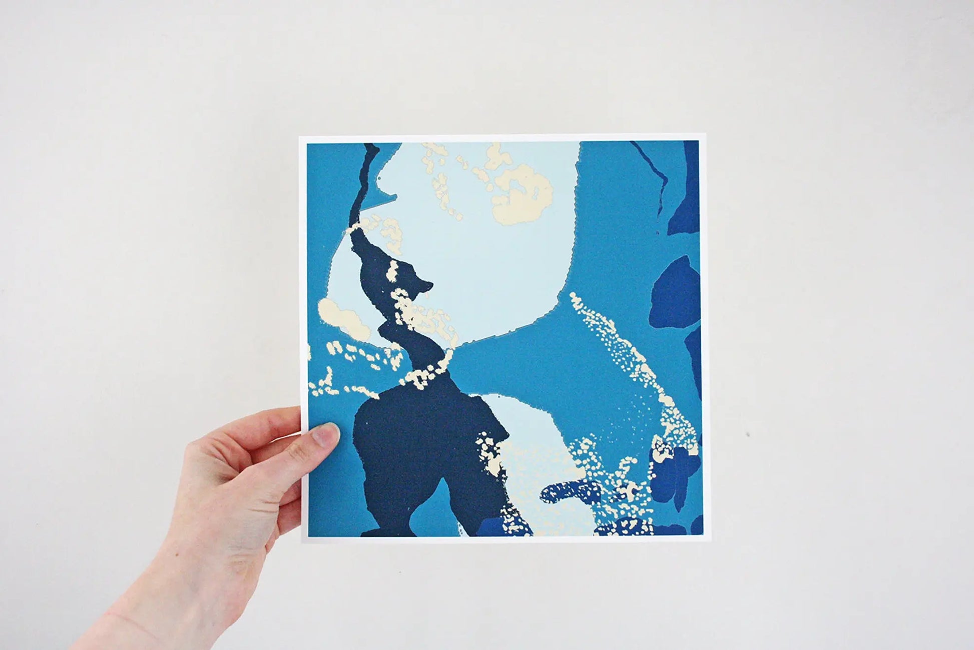 Photo of hand holding blue and turquoise Coastal Journey 5 abstract 8" print