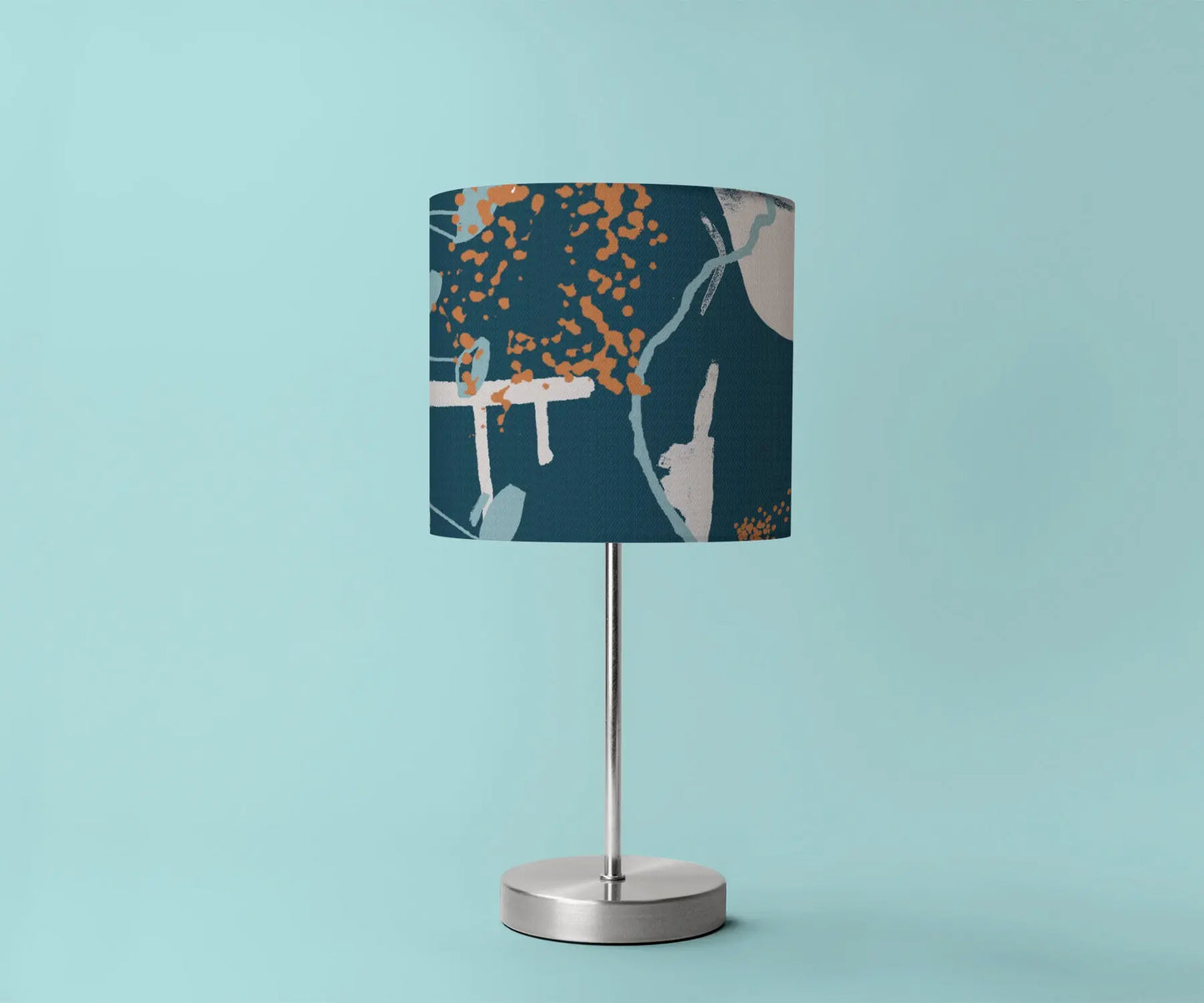 Digital mockup of 20cm green and orange abstract print handmade lampshade on silver table lamp