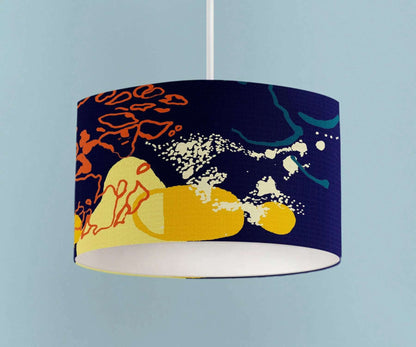 Digital mockup of 30cm navy, yellow and orange abstract print handmade lampshade on pendant ceiling lamp