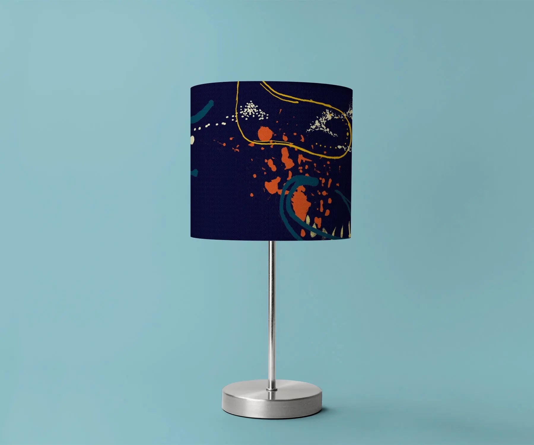 Digital mockup of 20cm navy, yellow and orange abstract print handmade lampshade on silver table lamp