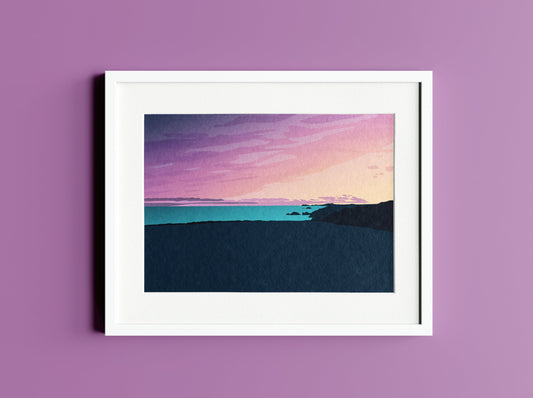Mock up of a purple, orange and blue illustration of the sunset at Newgale beach in a white frame on a purple background.