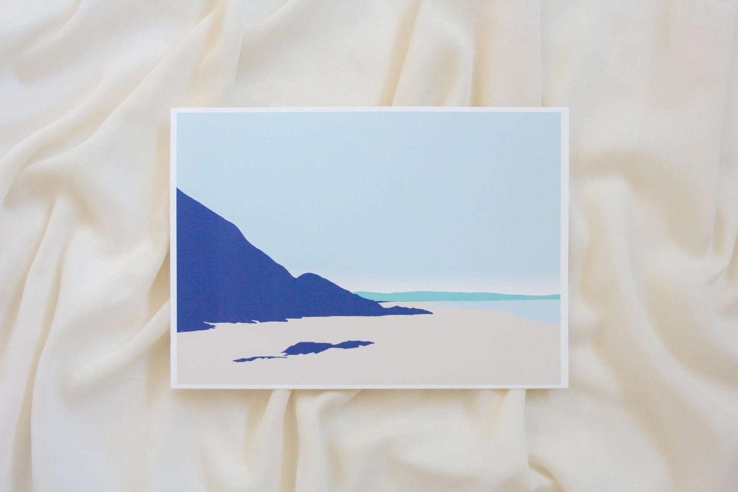 Photo of Pwll March to Newgale beach illustration print on cream fabric backdrop