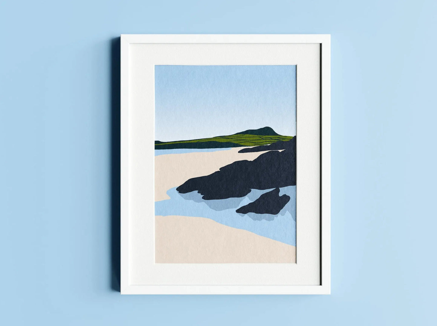 Digital mock up of Whitesands beach print in white frame on blue wall backdrop