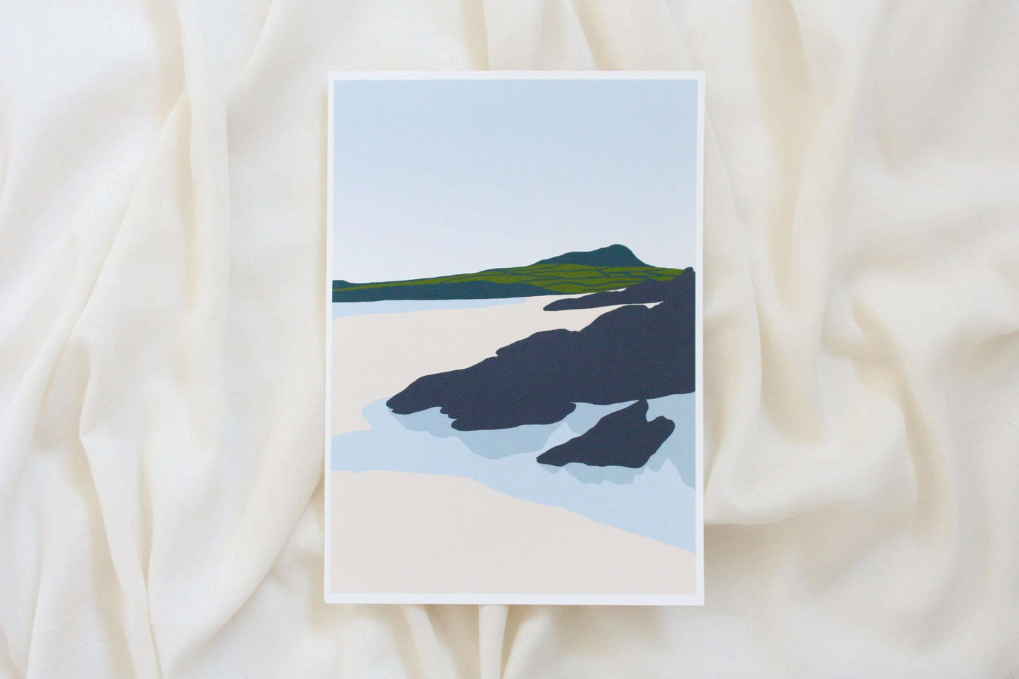 Photo of green and grey Whitesands beach print on cream fabric backdrop